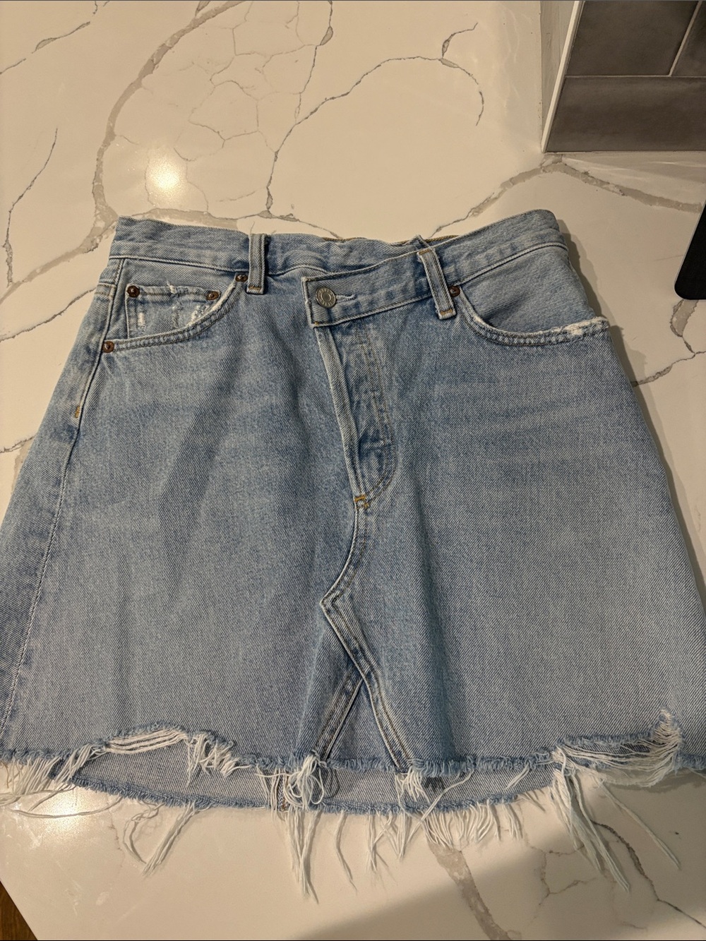 Agolde Light Blue Denim Mini Skirt with Frayed Hem